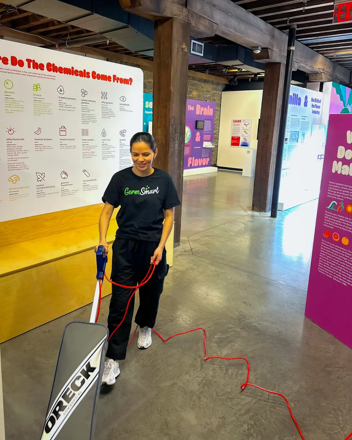 GermSmart cleaner operating floor equipment in a public exhibition space